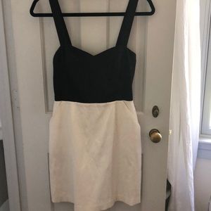 Black and white cocktail dress with cutout back